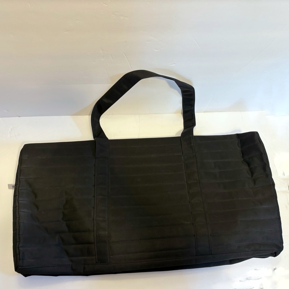 NWOT Black Duffel Bag with Minimalist Design